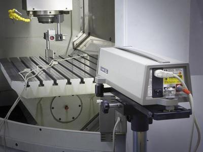 Illustration of Agilent laser interferometer setup for linear measurement with Calsure error assessment and correction software.